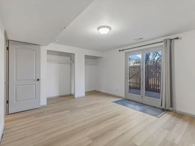 Wood-finish flooring with dual built-in closets