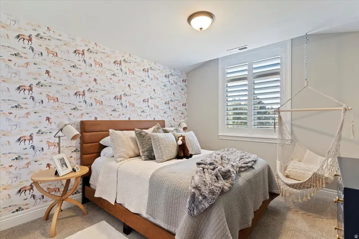 Accent wall featuring patterned wallpaper