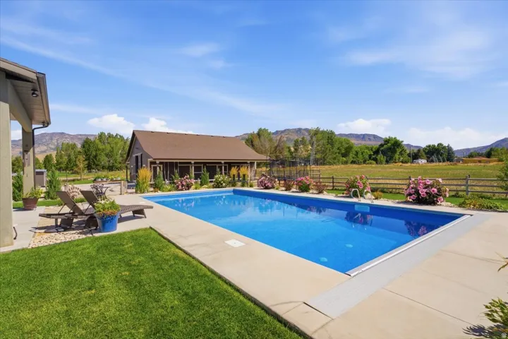 Outdoor swimming pool with concrete surround