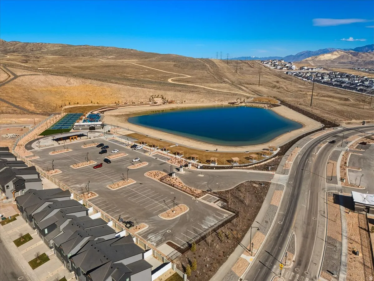 Serene blue water feature surrounded by natural terrain
