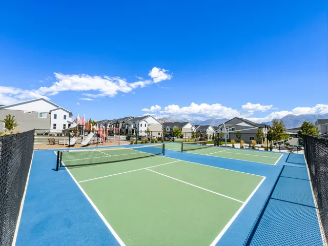 Two dedicated pickleball courts with chain-link fencing