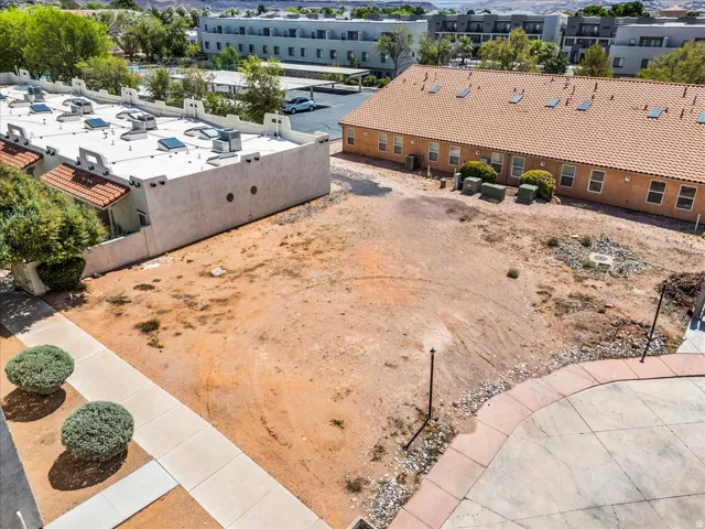 Unfinished lot with a paved patio area