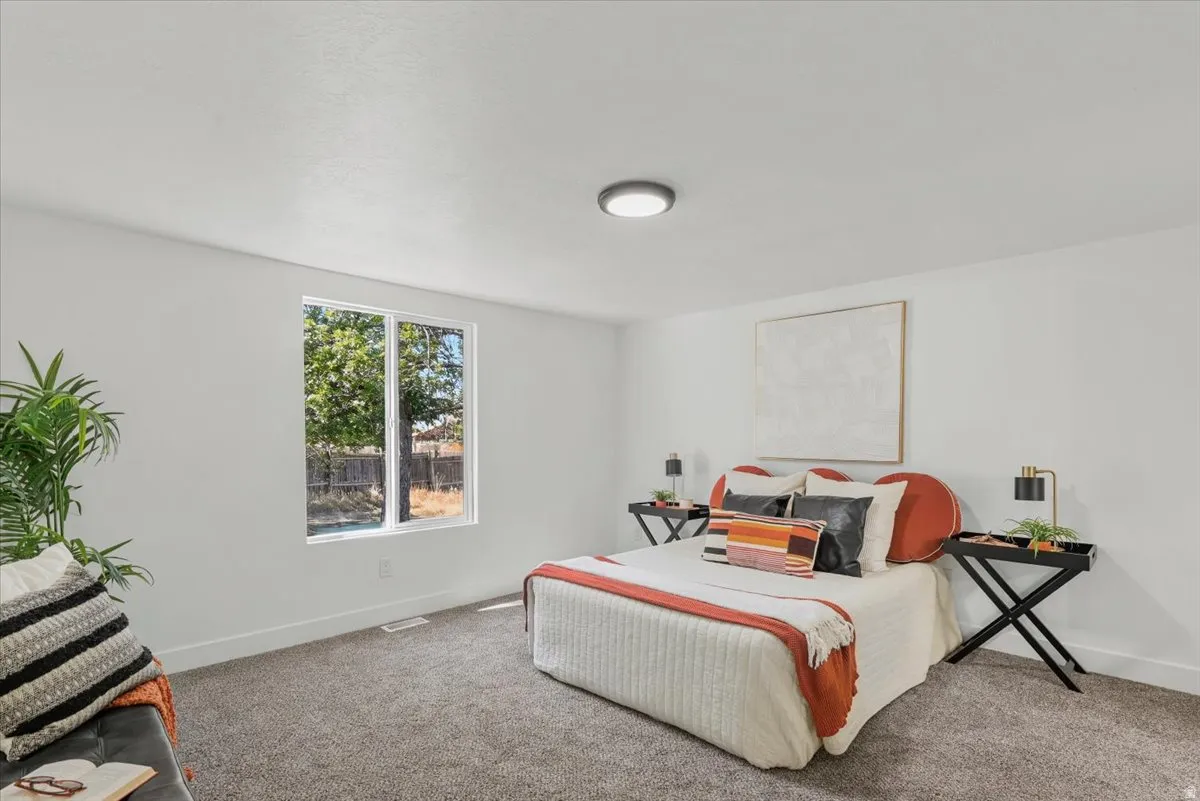 White painted walls, carpeted flooring