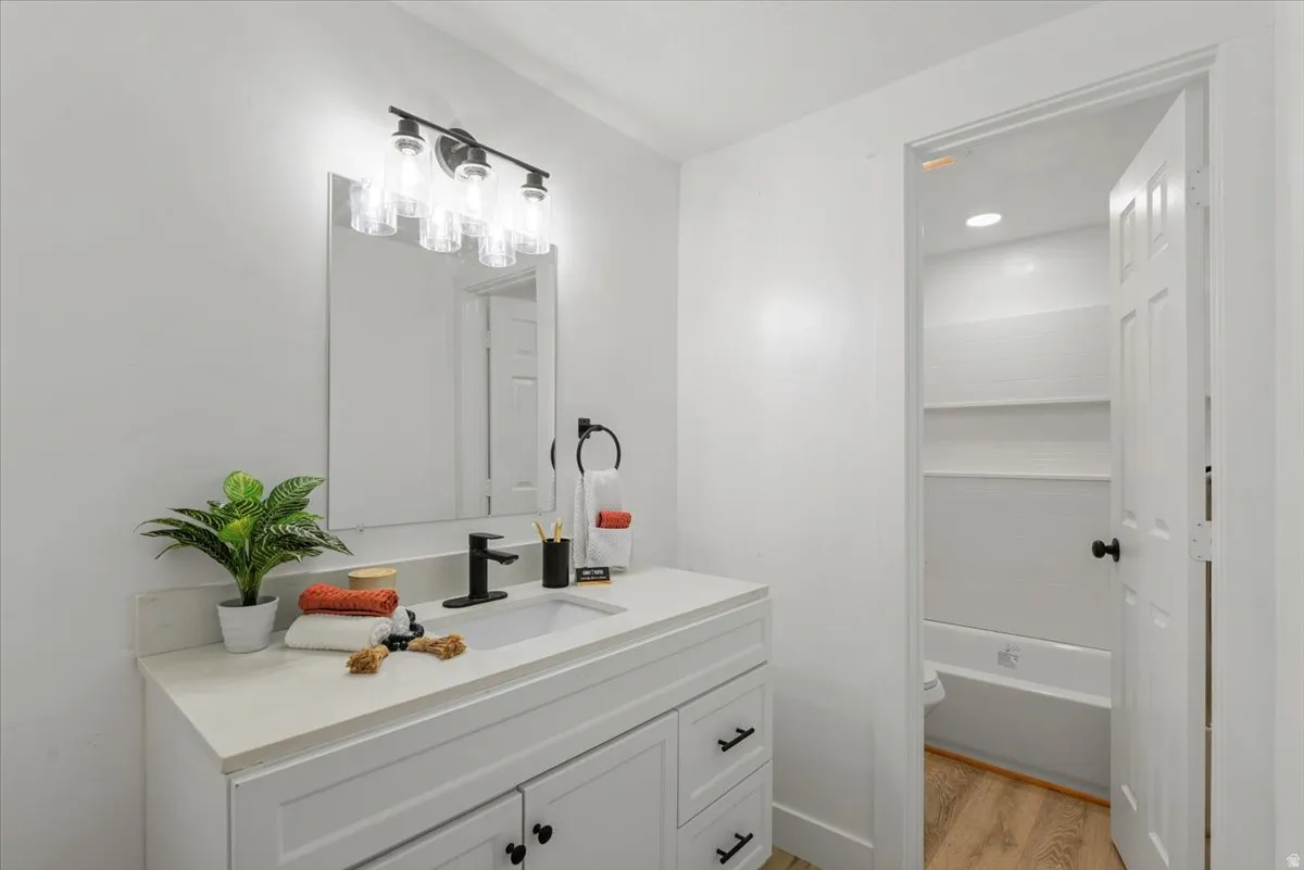White vanity with shaker-style cabinetry