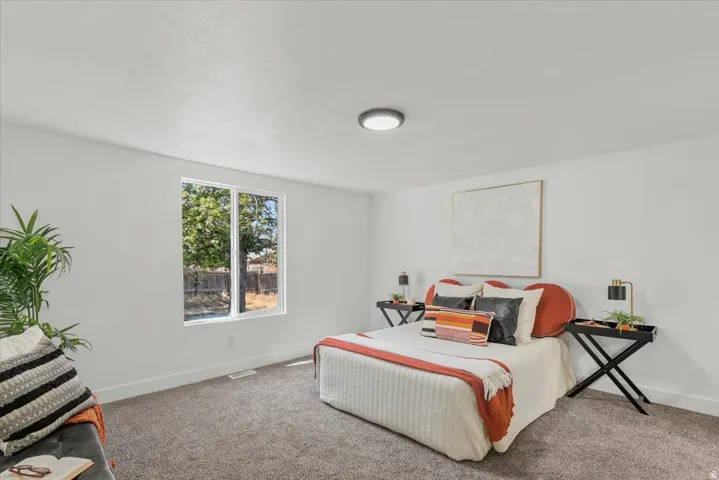 White painted walls, carpeted flooring