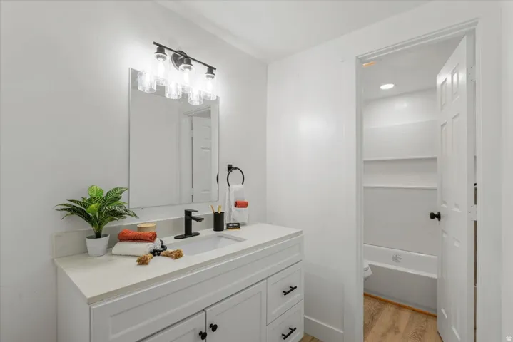 White vanity with shaker-style cabinetry