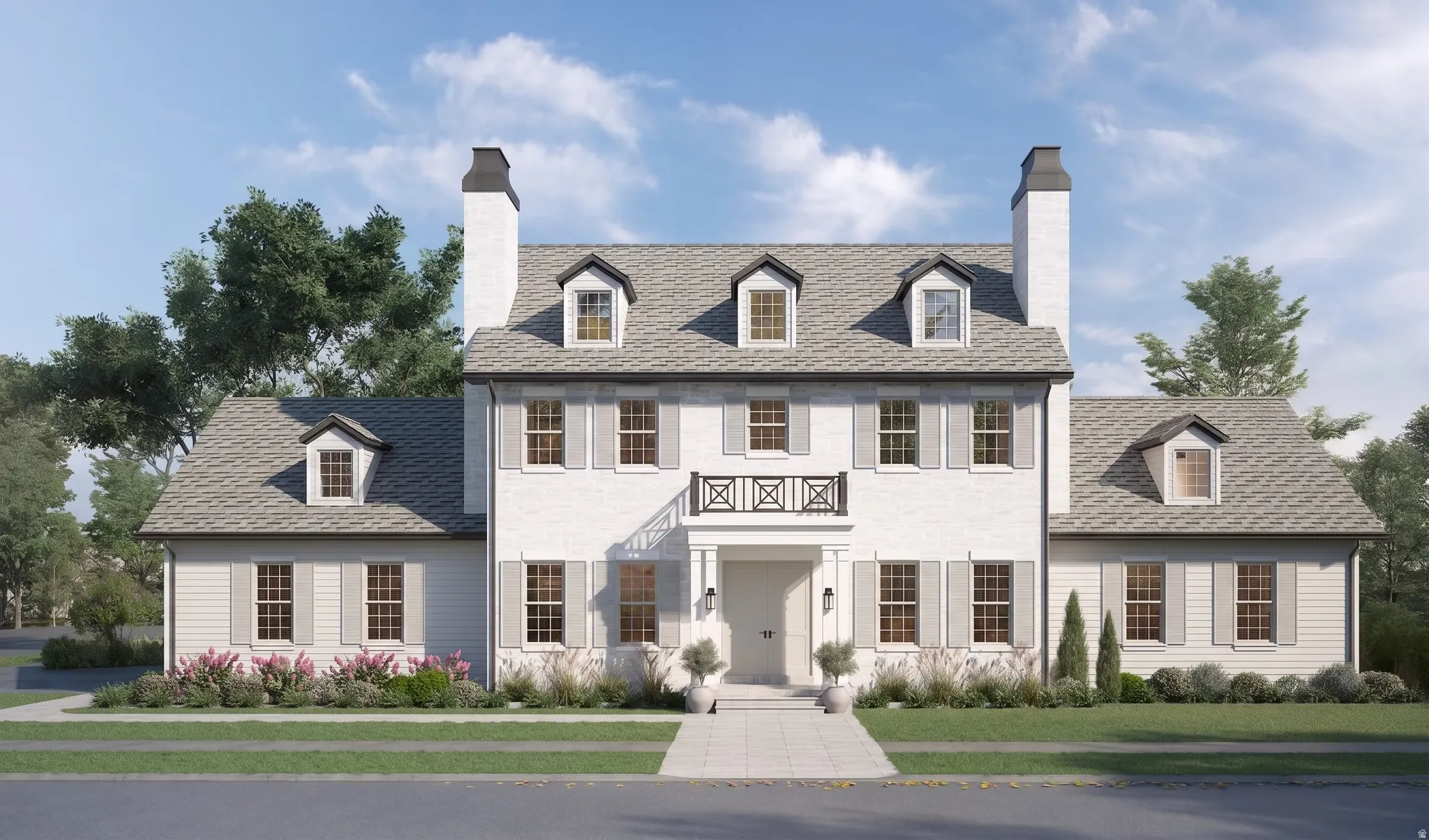 White brick and horizontal siding exterior, gray shingle roof, multiple dormer windows, twin chimneys, and a prominent front entrance with a balcony