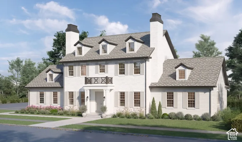 White brick and horizontal siding exterior with multiple dormer windows and a covered entry