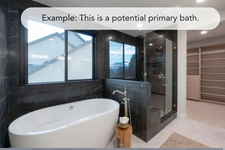 Freestanding soaking tub with floor-mounted faucet, black marble-look wall tiles, glass-enclosed shower with dual showerheads, and built-in shelving