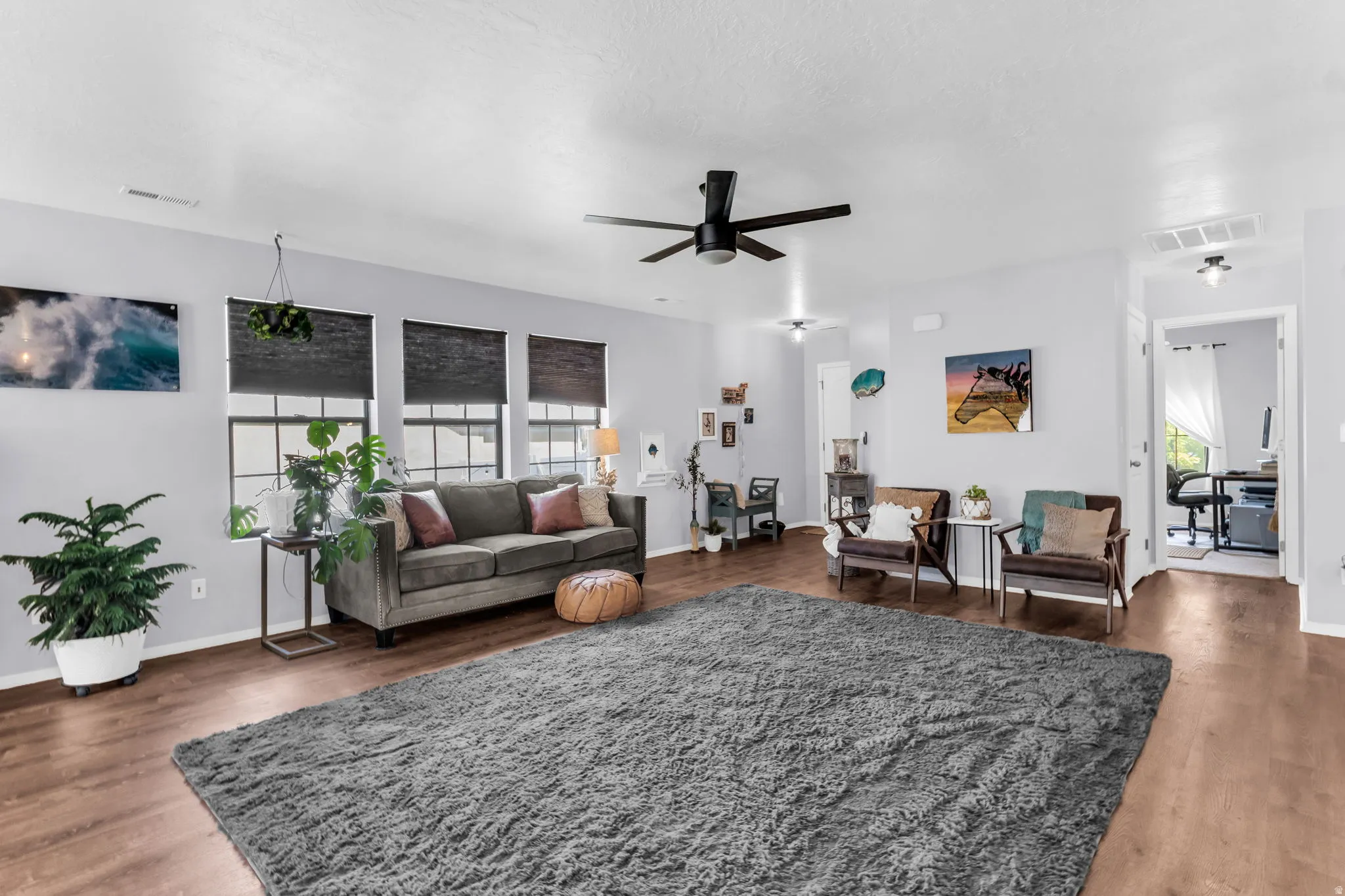 Light and bright open family room.  Glimpse of the 3rd bedroom used as an office currently.
