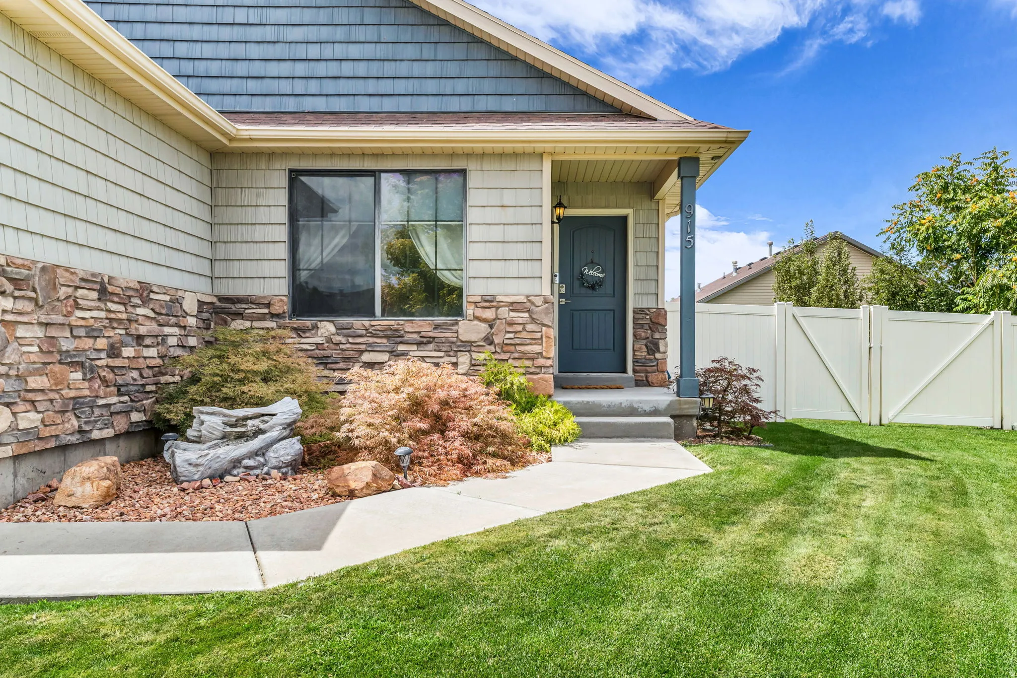 Stone and lovely shake style siding