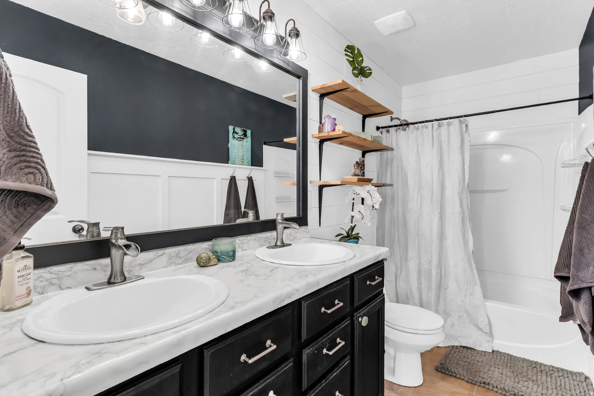 You'll love the shiplap walls and wainscotting!