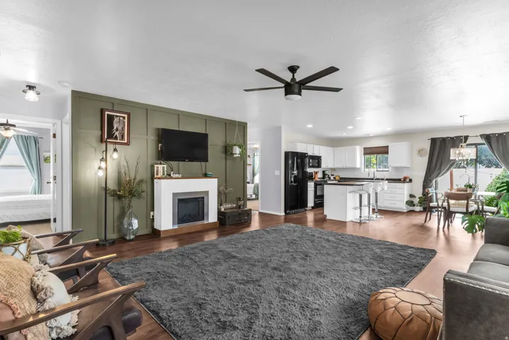 Large open greatroom with custom designed accent wall.