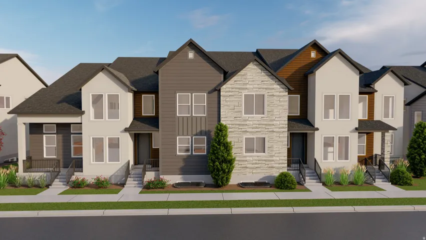 Modern townhome exteriors featuring varied siding, stone accents, and covered entryways