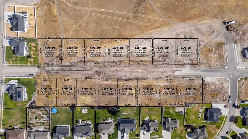 Plat Map. Illustrating the division of a land parcel into multiple lots with associated dimensions and property lines