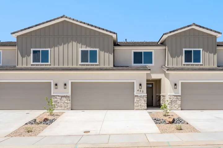 Contemporary exterior with stucco and board-and-batten siding