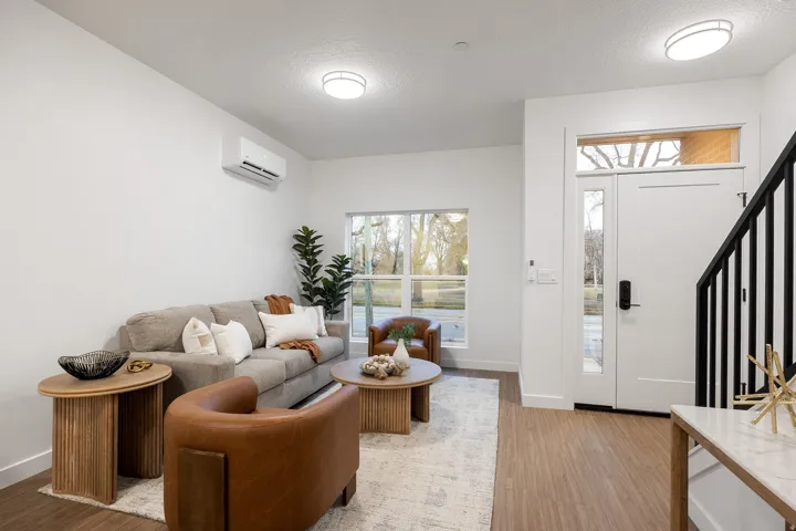 Light wood-finish flooring throughout the space