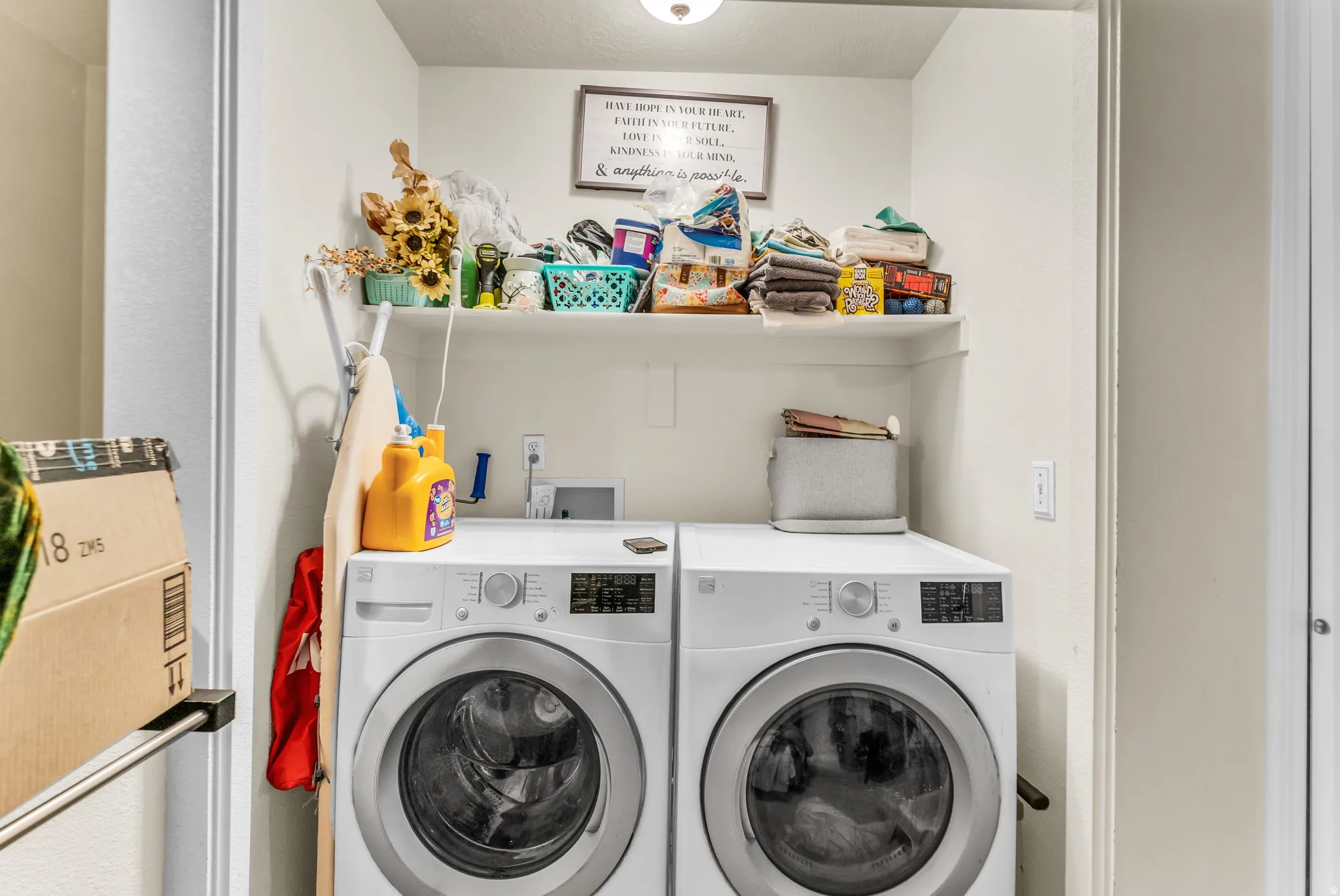 In-unit laundry facilities with upper shelving