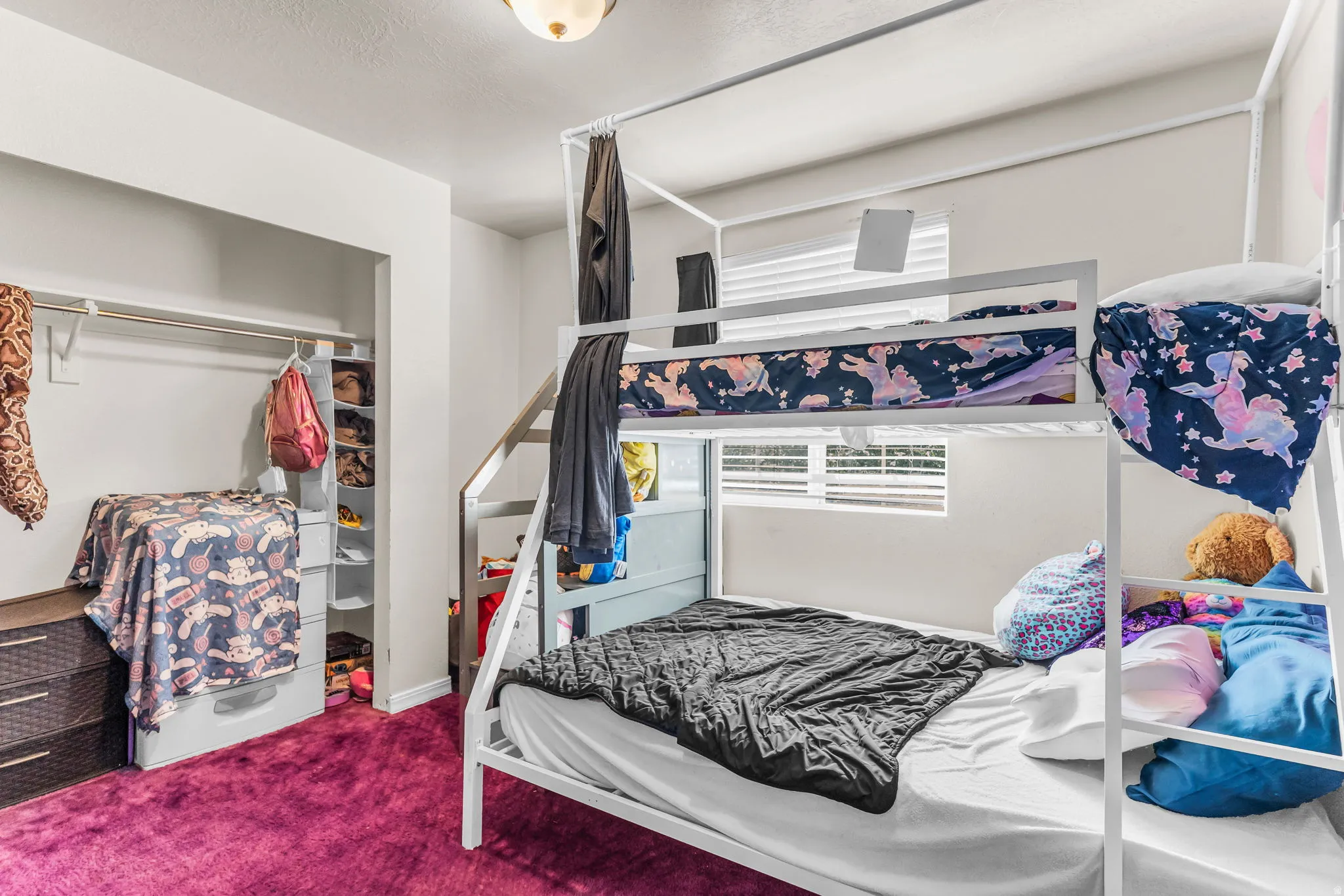 Built-in closet with hanging rod and shelving