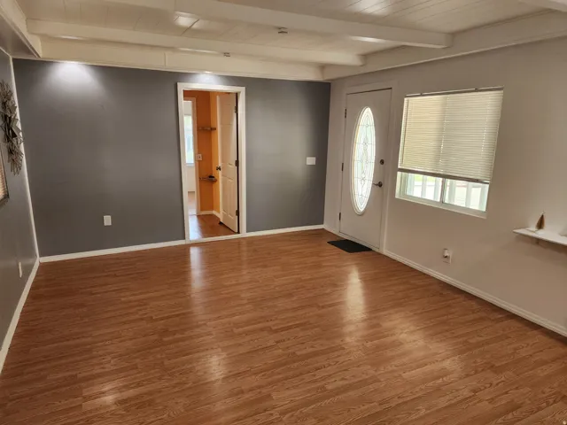 Wood-finish flooring throughout