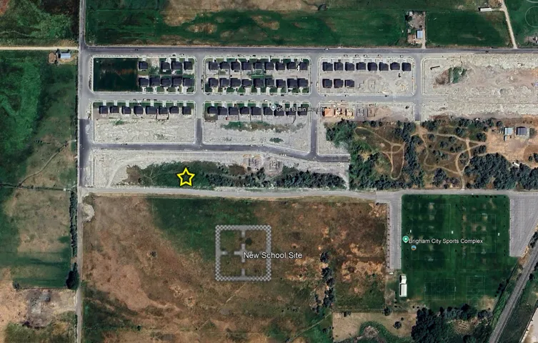 Aerial Map. Depicting the property, a new school site, and a sports complex