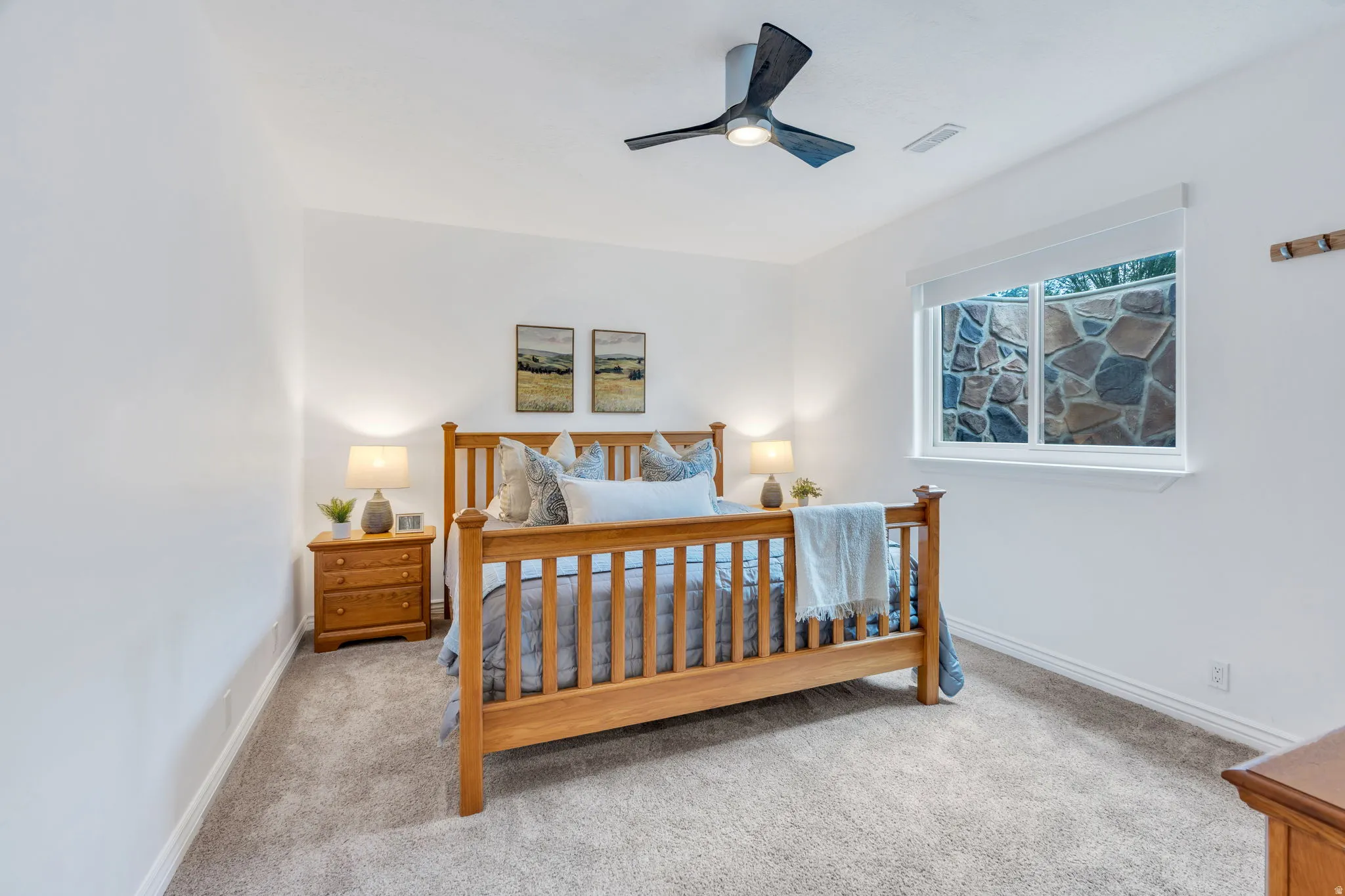 Spacious downstairs bedroom provides an excellent option for guests or extended family.