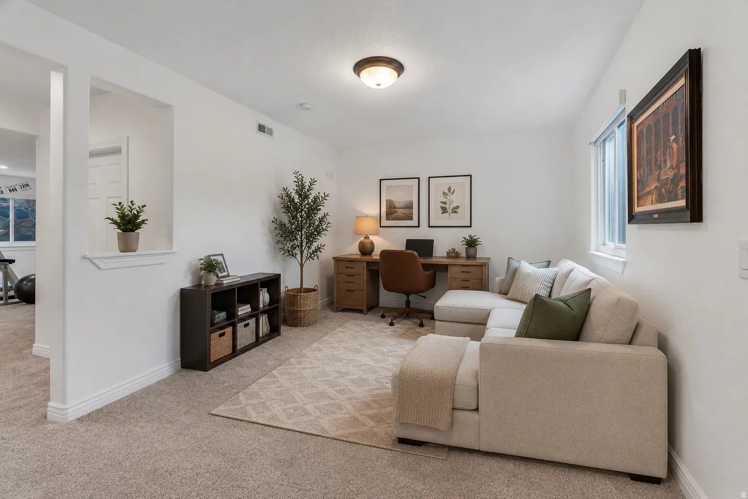 Versatile bonus area could serve beautifully as an office, reading nook, play space, or sitting area. Virtually staged as a sitting area to showcase one of the many possibilities for this flexible space.