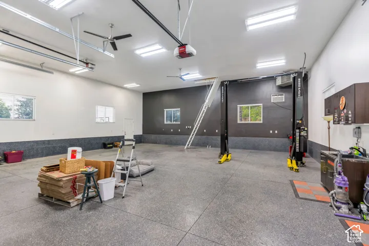 Rare detached garage offers tremendous flexibility for car enthusiasts, with 10,000 lb. car lift included!