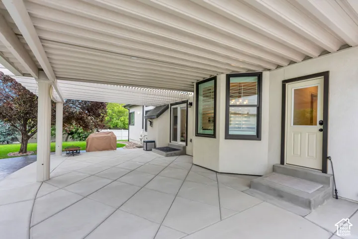 Generous patio space provides multiple options for outdoor seating, dining, and entertaining.