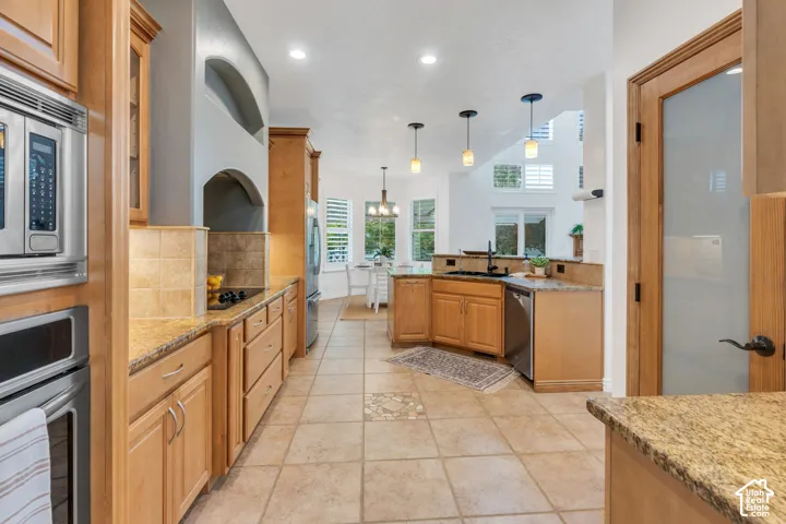 An abundance of cabinetry and counter space makes this kitchen as functional as it is attractive.