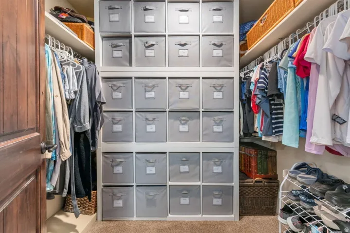 Built-in shelving with integrated storage cubbies