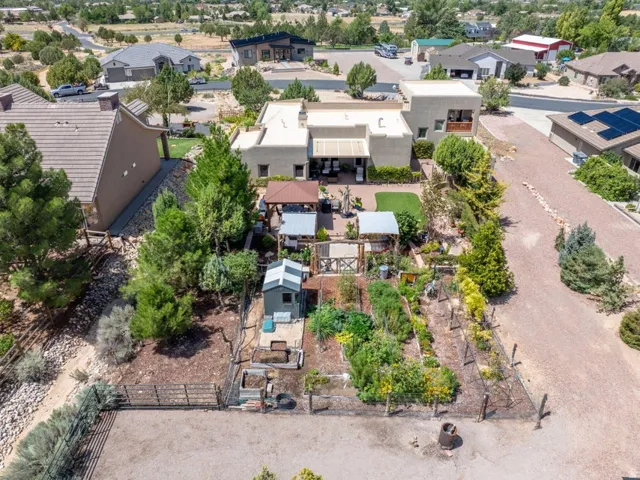 Southwestern-style architecture with a private balcony and covered patio