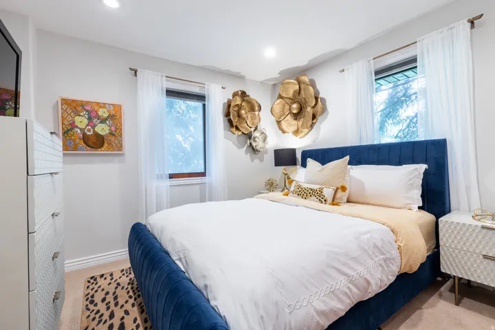 Recessed lighting, light gray wall paint, and carpeted flooring