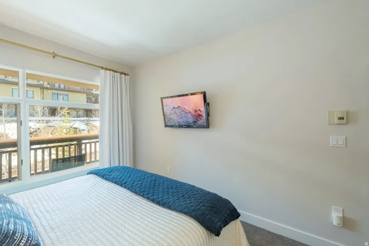 Expansive window with exterior balcony access