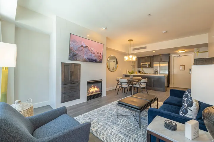 Integrated living space with a built-in fireplace and custom cabinetry