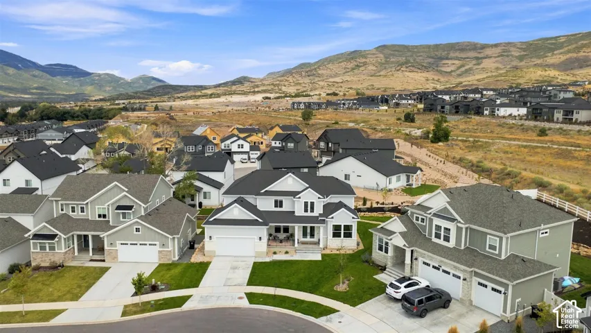 New construction residences featuring modern architectural design and well-maintained landscaping