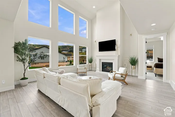 Vaulted ceilings, two story windows, gas fireplace with mantel