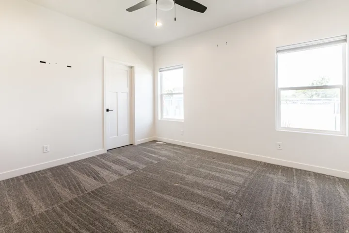 Recessed lighting and ceiling fan overhead