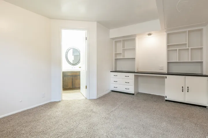 Carpet flooring complemented by white walls