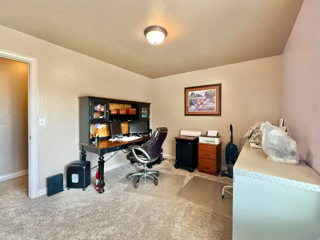 Wall-to-wall carpeting and neutral wall tones
