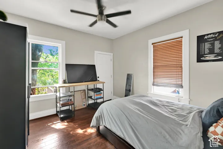 Hardwood-finish flooring throughout, complemented by light-toned walls and crisp white trim