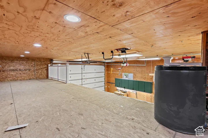 RV garage mezzanine storage, overhead wench system, RV garage door, boiler heating system