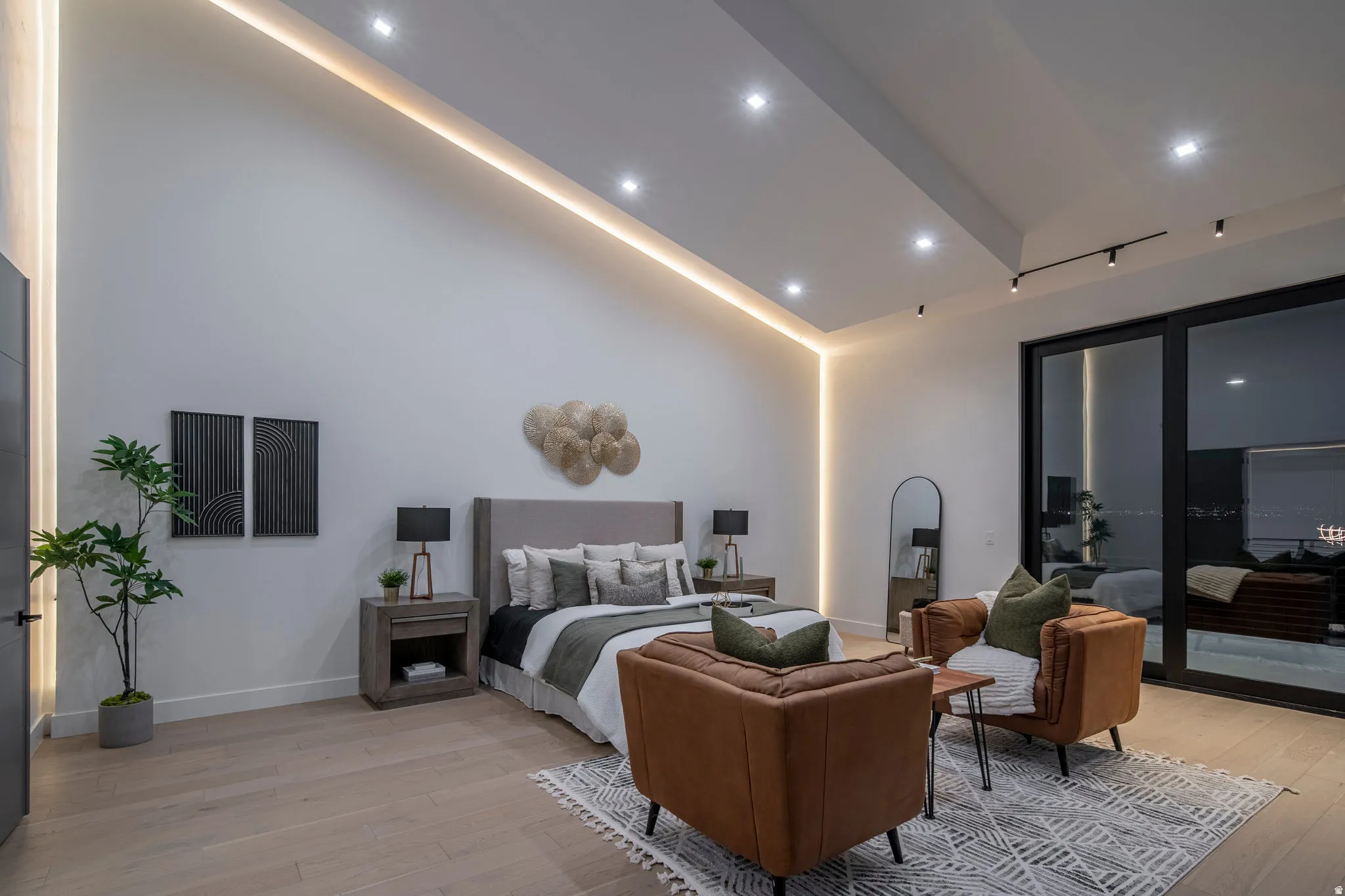 Vaulted ceiling with recessed lighting and cove lighting