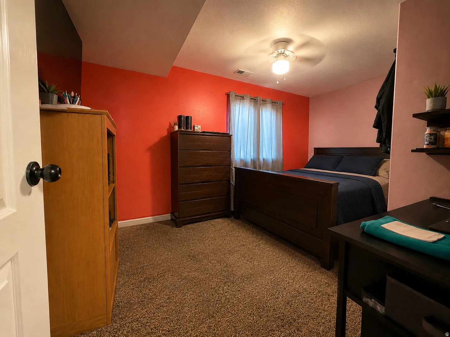 Wall-mounted ceiling fan with light fixture