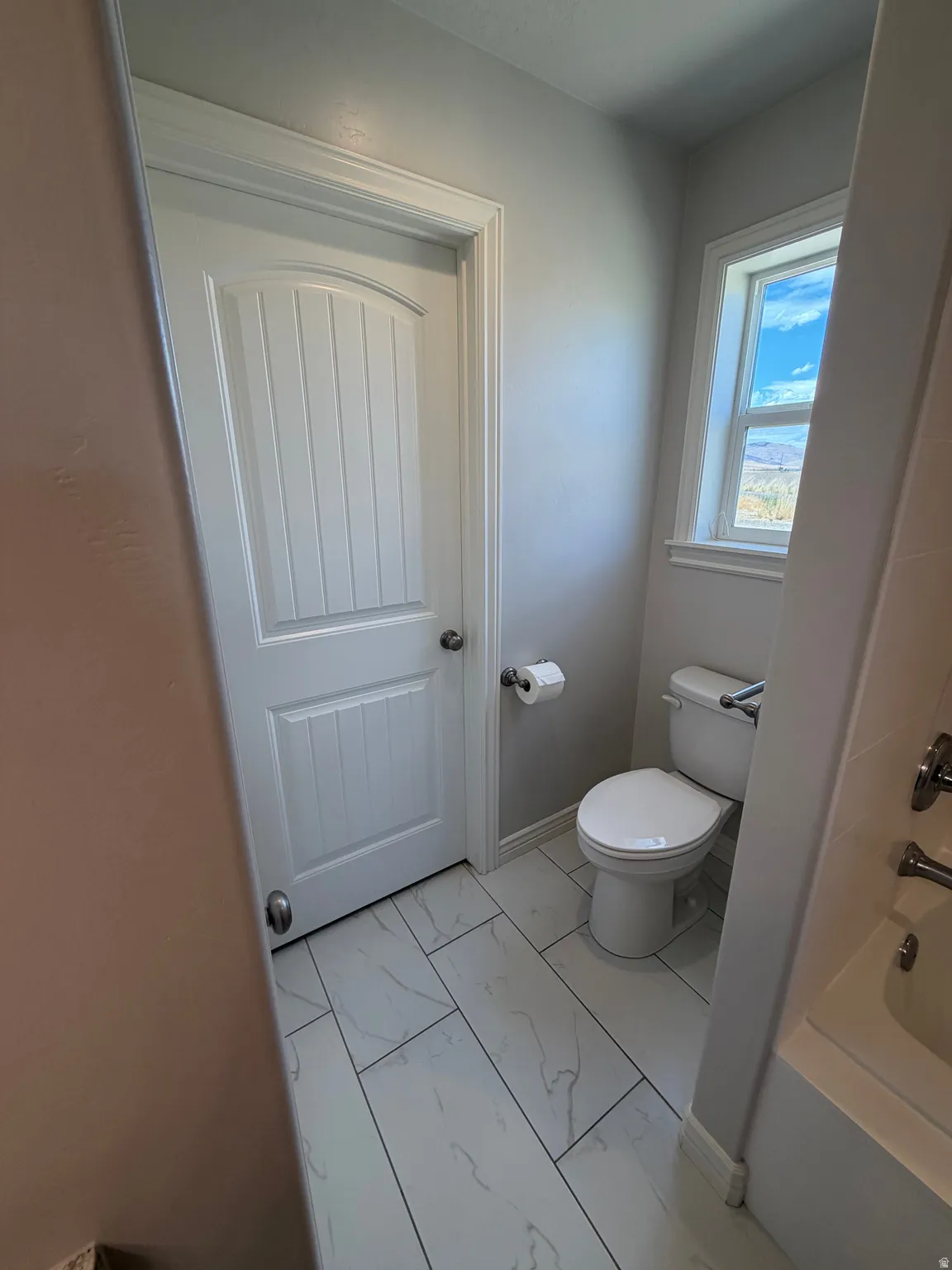 Primary Suite Bathroom, Walk-in Closet Entrance