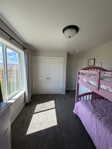Bedroom 2: Large double closet doors, with built in organizer, large window with amazing views!