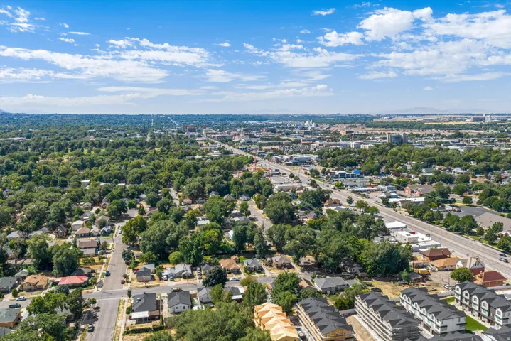 Aerial perspective of a developed urban area with extensive tree canopy