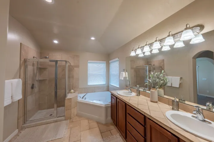 Dual vanity with undermount sinks and tile countertop
