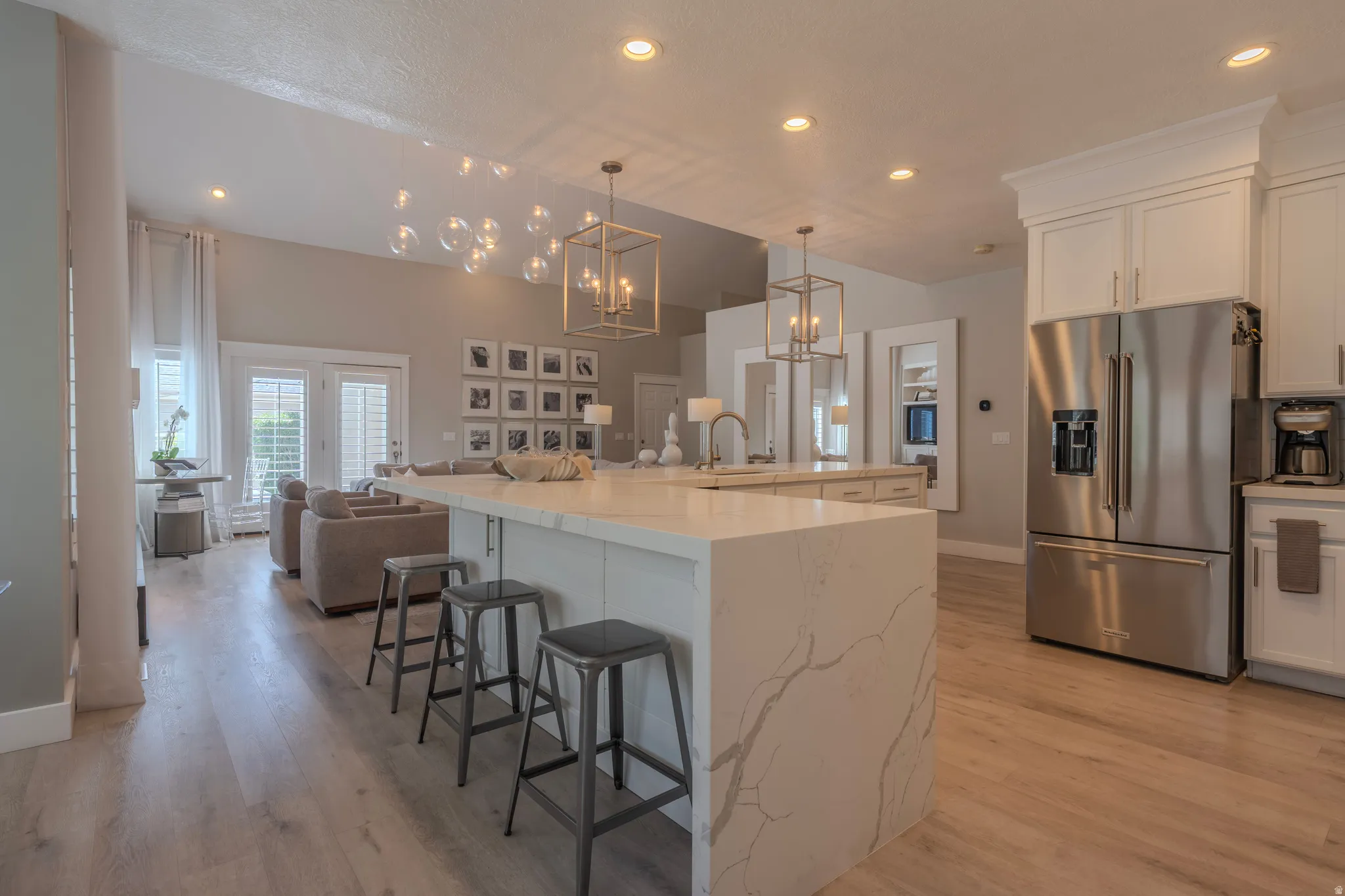 Spacious interior with wood-finish flooring and recessed lighting