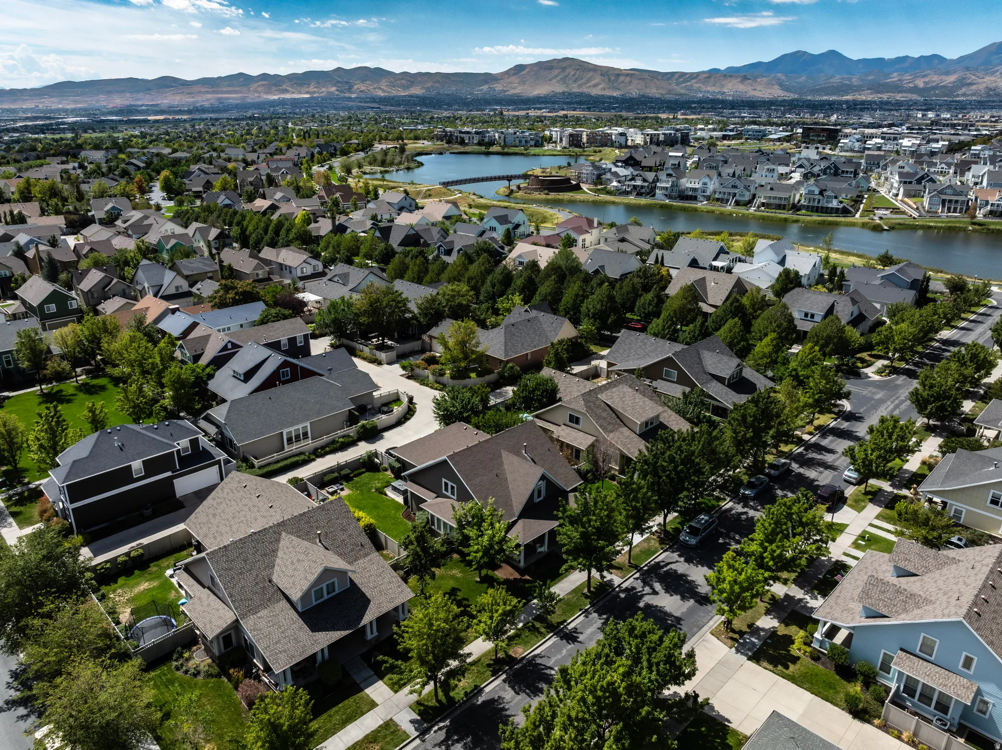 Residential neighborhood featuring extensive green spaces and mature trees